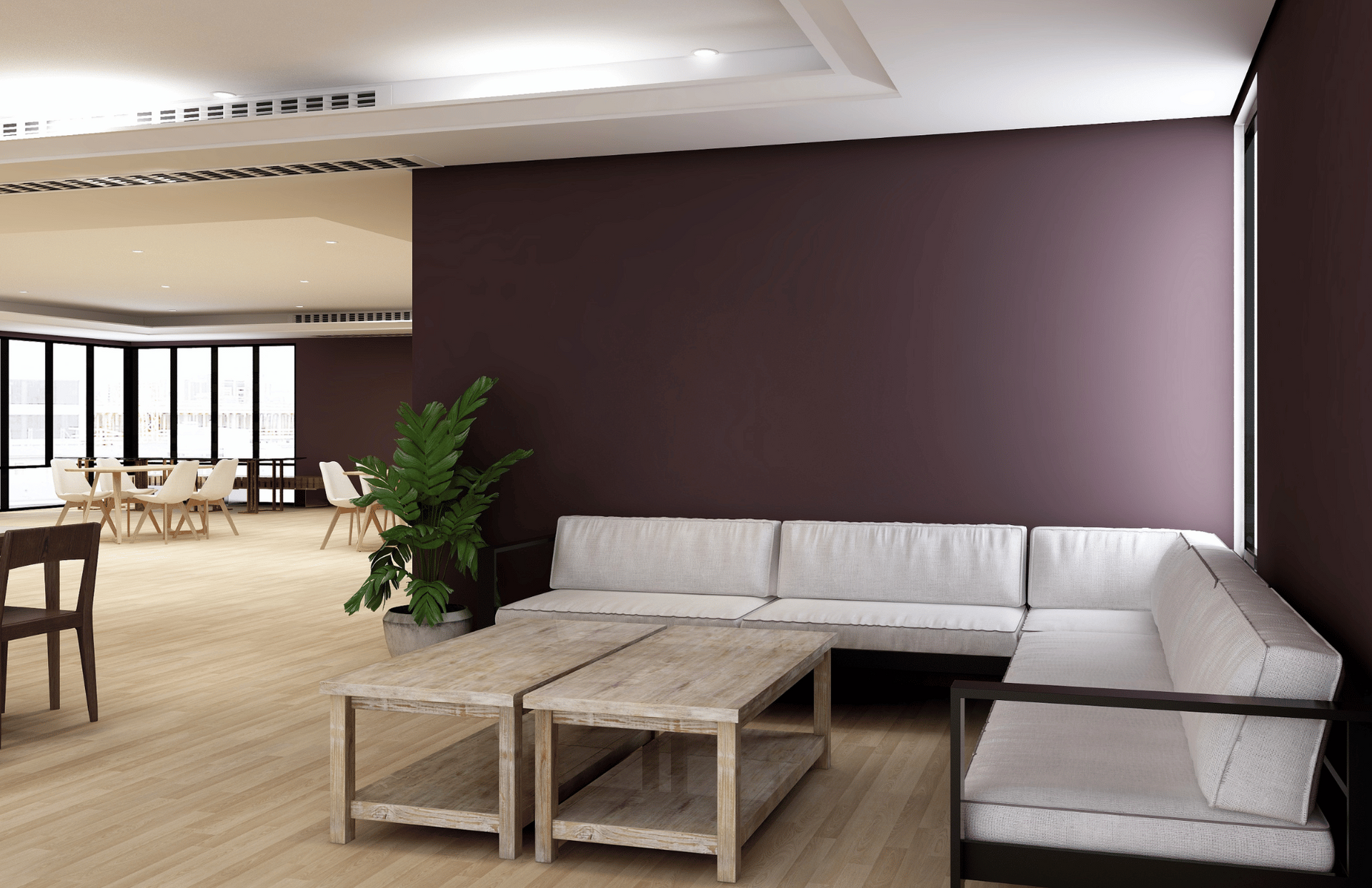 A living room with purple walls and white furniture