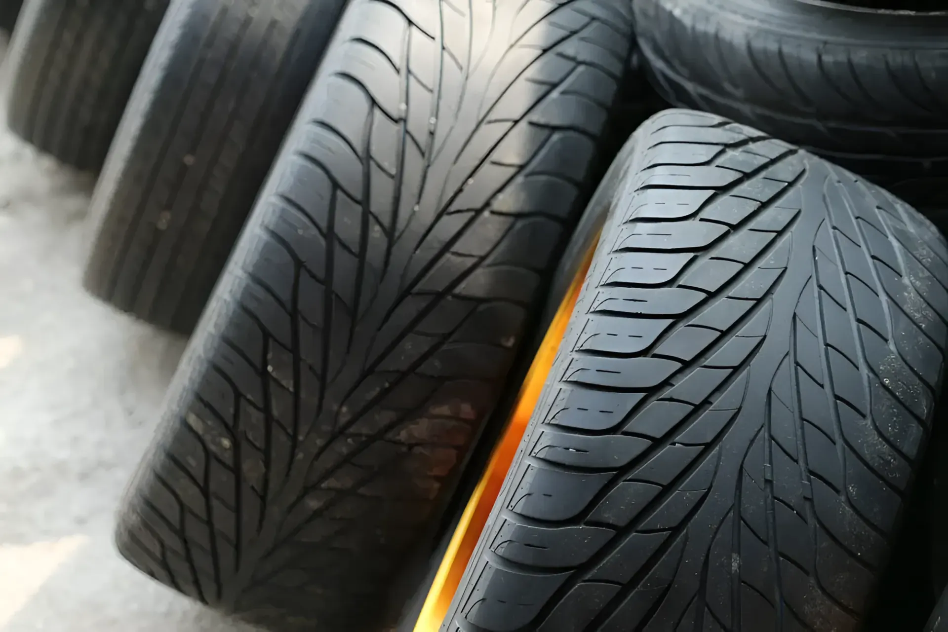 Close-up of a Stack of Black Tires With Tread Patterns — Innisfail Pro Motors in Mission Beach, QLD
