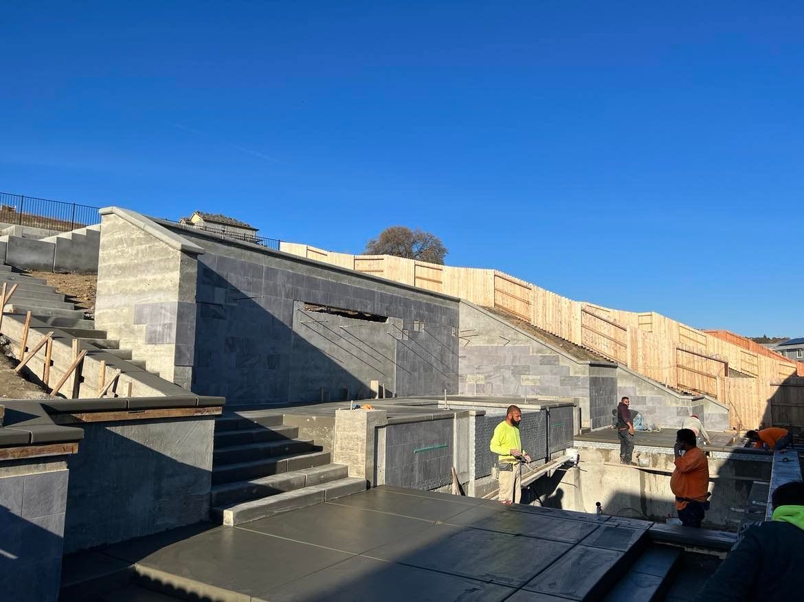 WEST VILLAGE CONCRETE RETAINING WALL COMPLETE