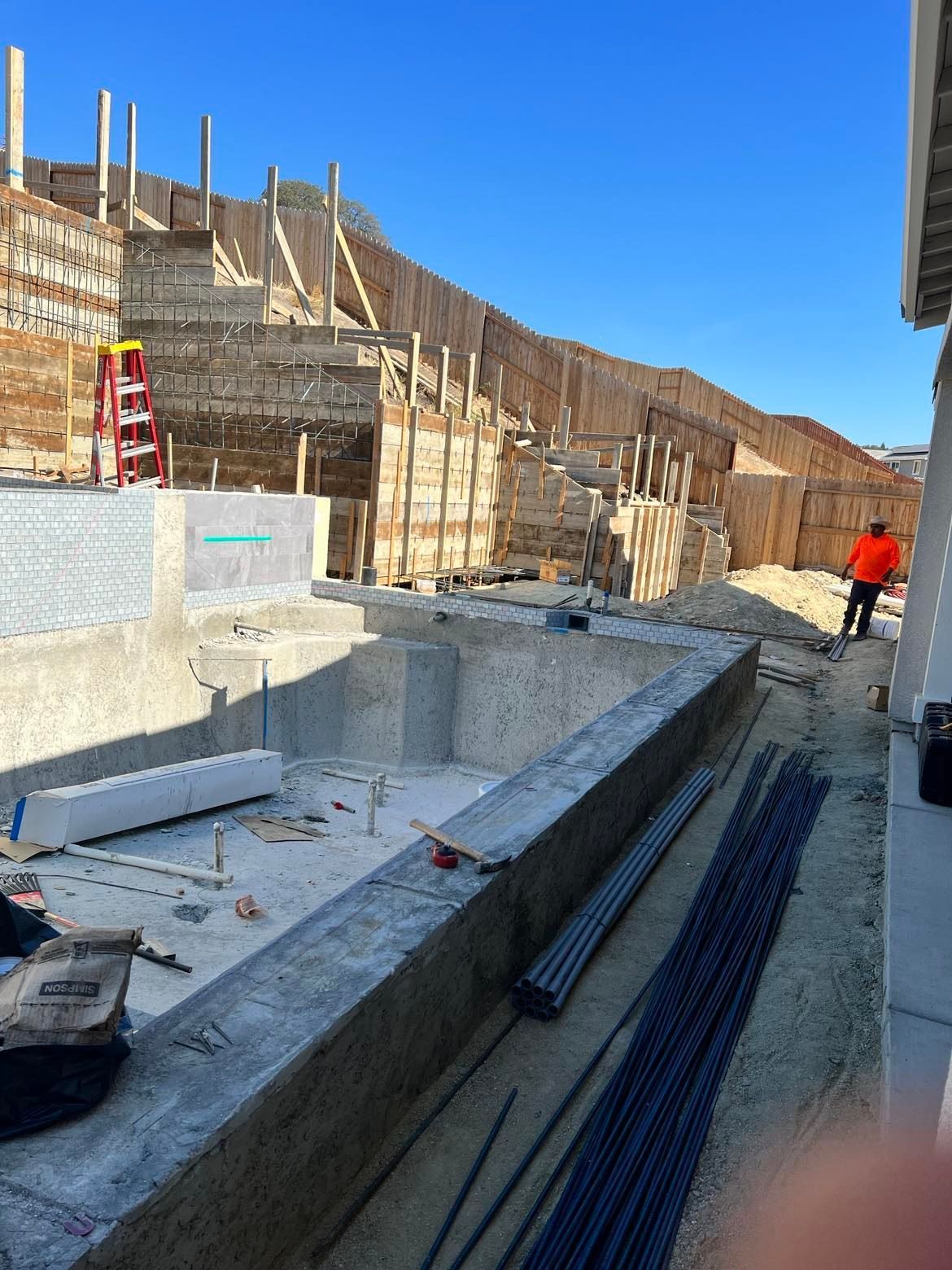 WEST VILLAGE CONCRETE RETAINING WALL FRAMING PLANNING