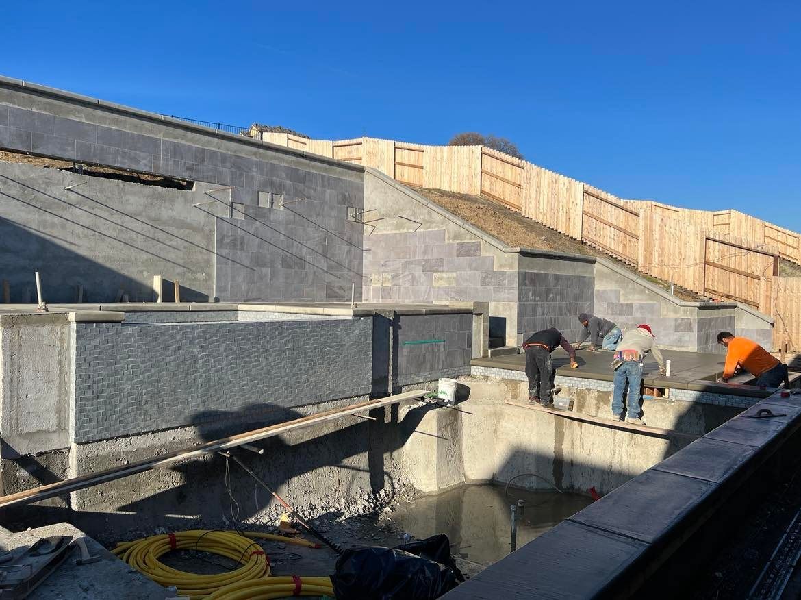 WEST VILLAGE CONCRETE RETAINING WALL COMPLETE