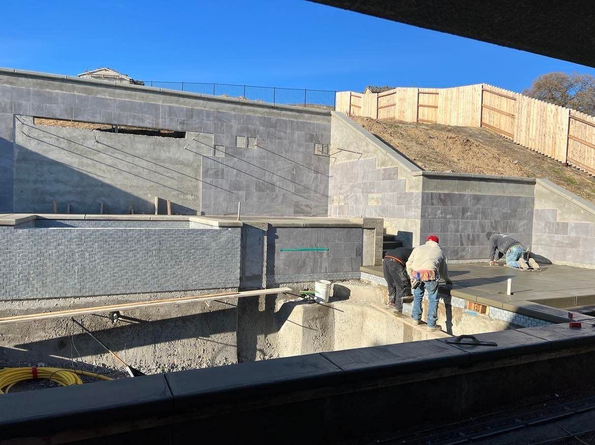 WEST VILLAGE CONCRETE RETAINING WALL COMPLETE