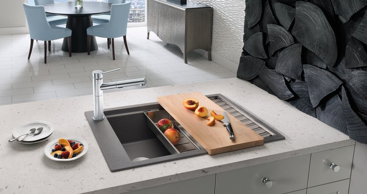 Porcelain countertops with a matte finish in a bright and airy kitchen.