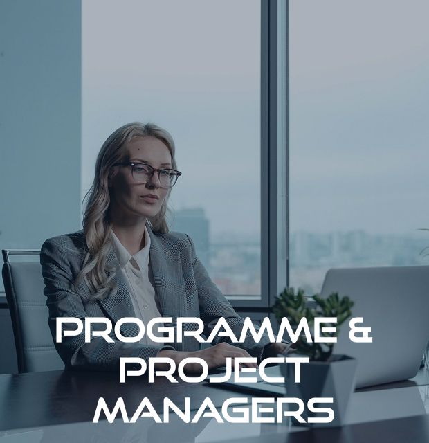 A woman is sitting at a desk with a laptop and the words programme & project managers on the bottom