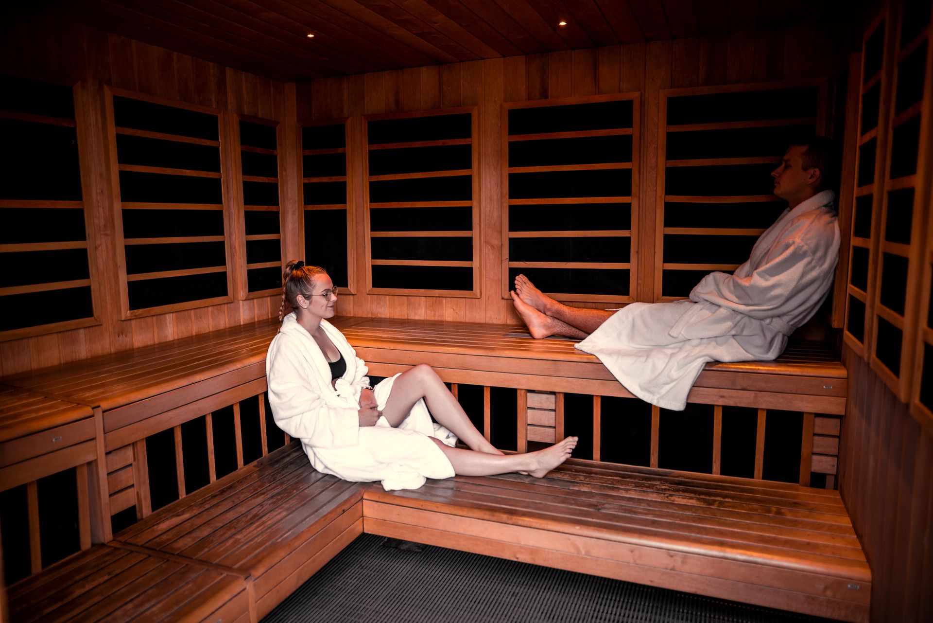 a couple enjoying the infrared and regular sauna at krauma geothermal
