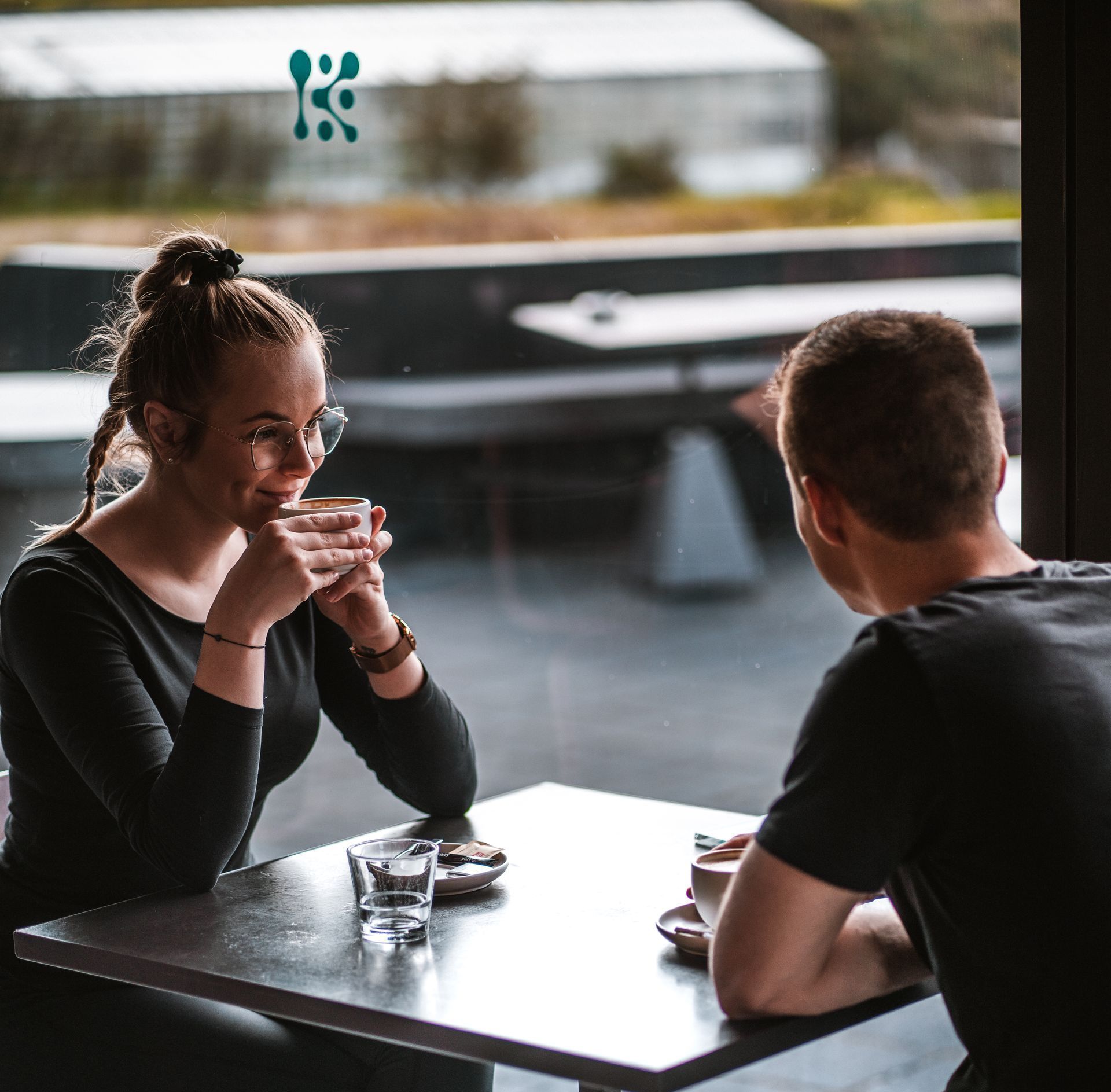 a couple having a nice dinner at Krauma Geothermal Restaurant after soaking in the hot pools