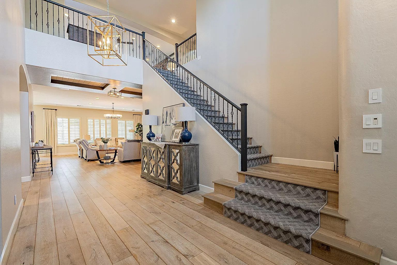 There is a staircase leading up to the second floor of a house.