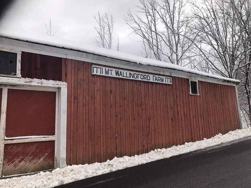side of old red barn