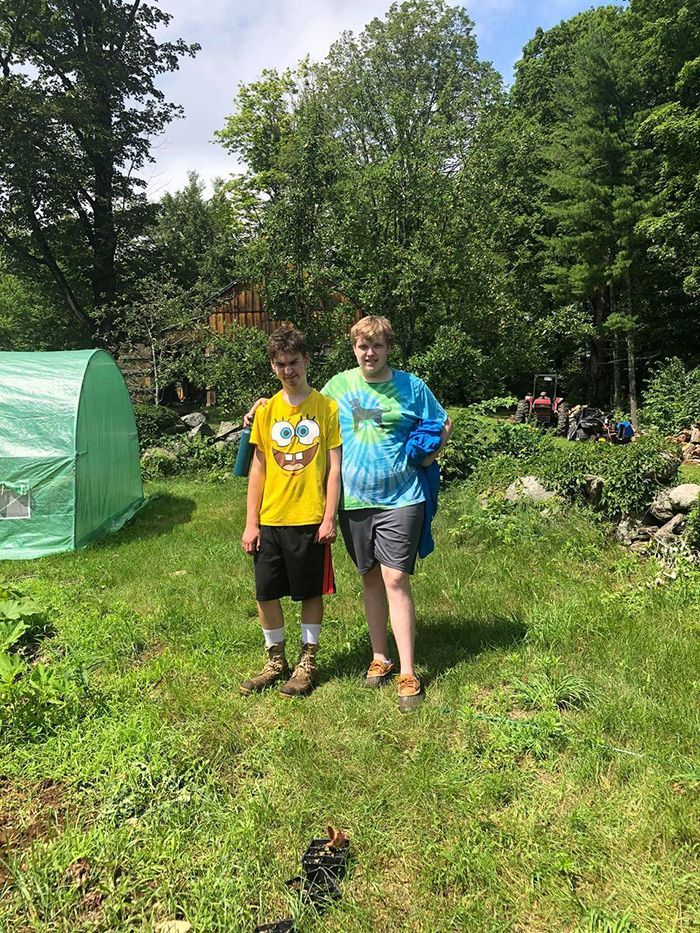 kids standing out on the lawn