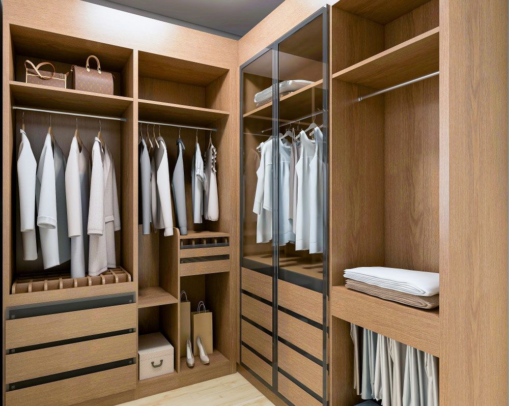 A Walk in Closet Filled with Clothes and Drawers — Rodney Lees Cabinetmaking In Monaltrie, NSW