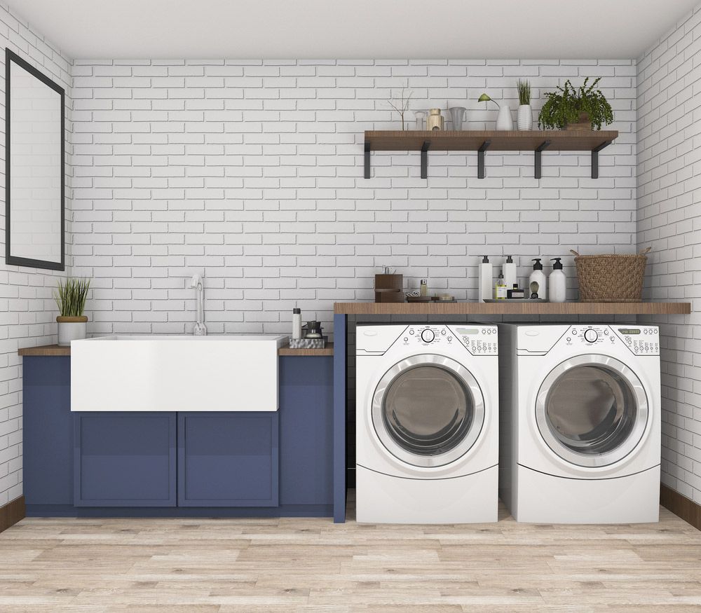 A Laundry Room with Two Washing Machines and A Sink — Rodney Lees Cabinetmaking In Casino, NSW