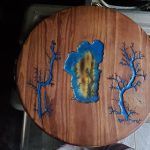 Wooden serving tray with blue and yellow epoxy inlay and fractal burns.