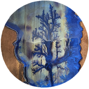 Circular artwork with blue dendritic patterns resembling a tree, copper edges, and a blue and brown background.