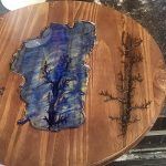 Wooden serving board with blue resin detail, and fractal wood burning.
