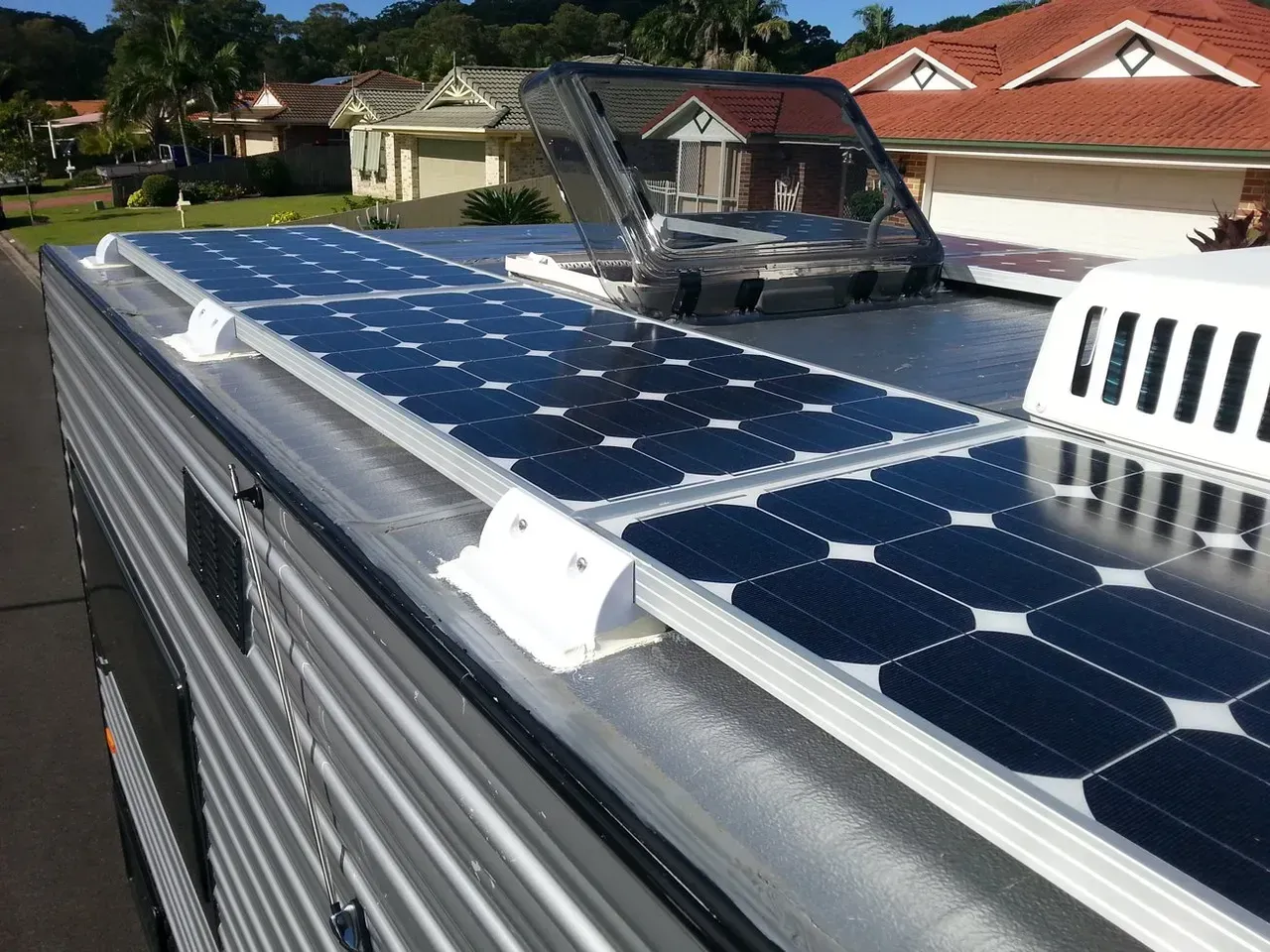 A Roof With A Lot Of Solar Panels On It — Affordable Caravan Repairs in Bundaberg, QLD