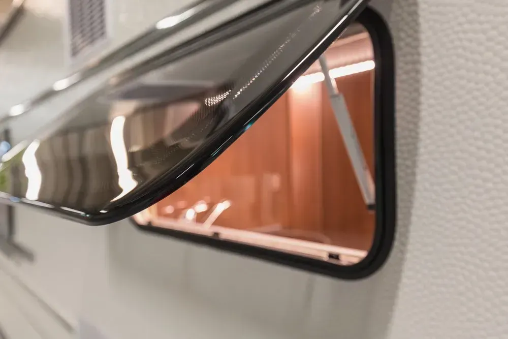 A Close Up Of A Window On A Camper With The Window Open — Affordable Caravan Repairs in Bundaberg, QLD