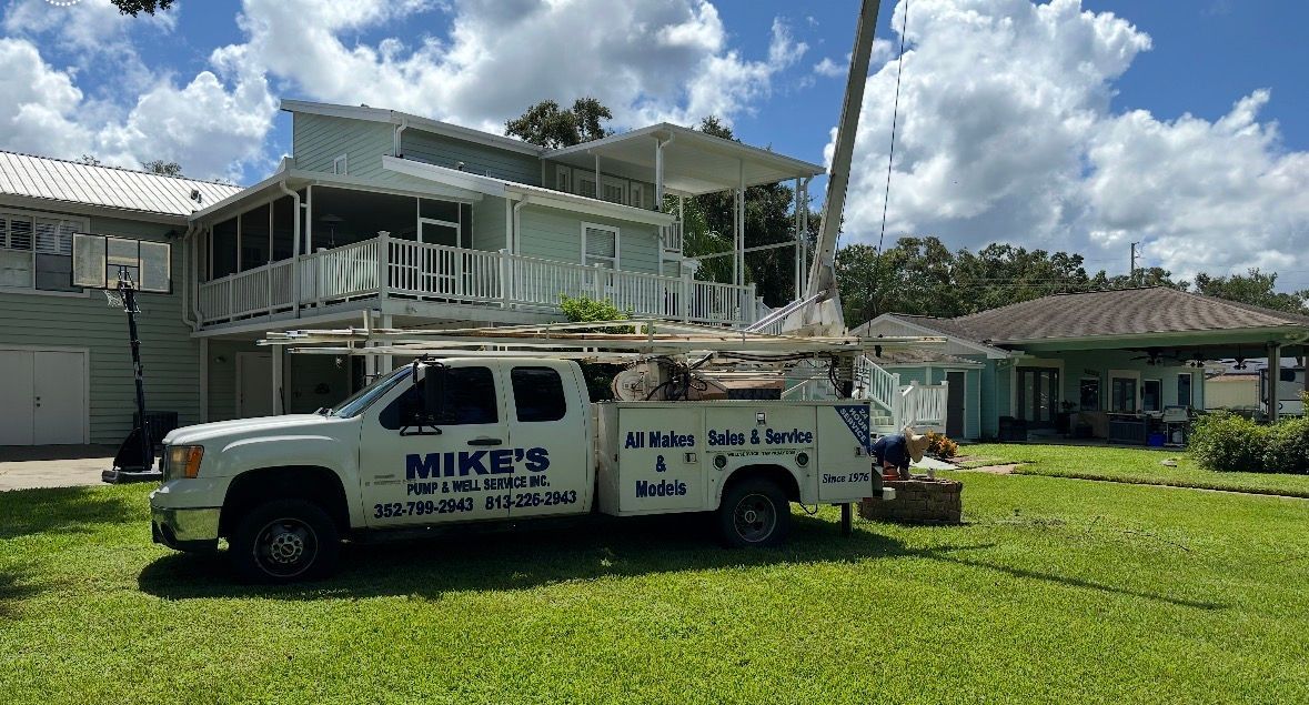 Mike's Pump and Well Service truck setup to pull submersible pump