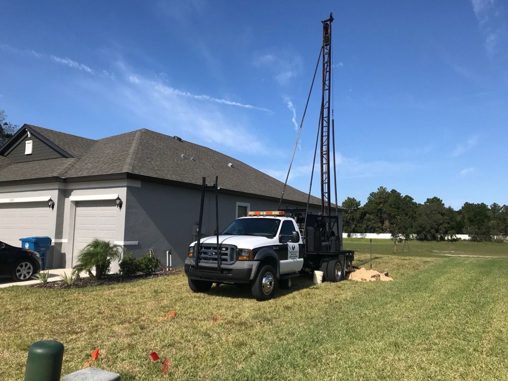 A water tank with a pump attached to it