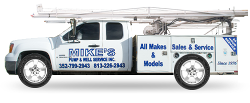 A white truck that says mike 's on the side A white truck that says mike 's on the side