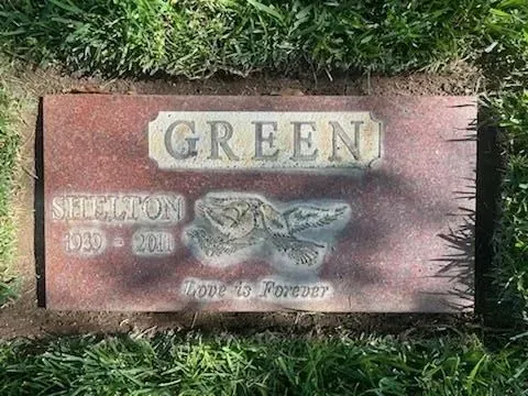 Red granite headstone with 