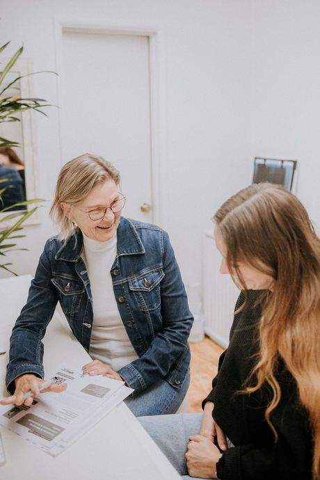 Julie works with a client.