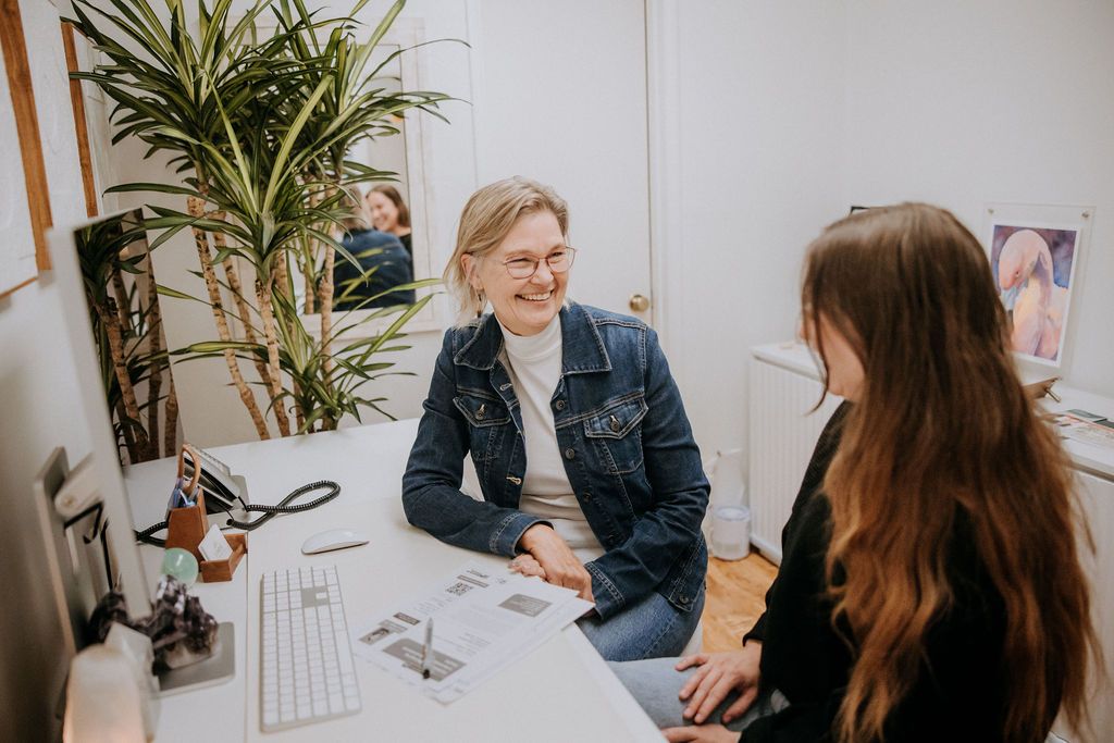 Julie works with a client.