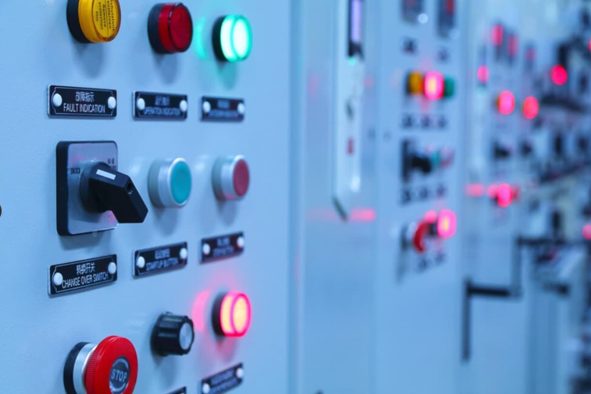 A Row Of Electrical Switches And Lights On A Wall — Mozzlec Electrical In Urangan, QLD