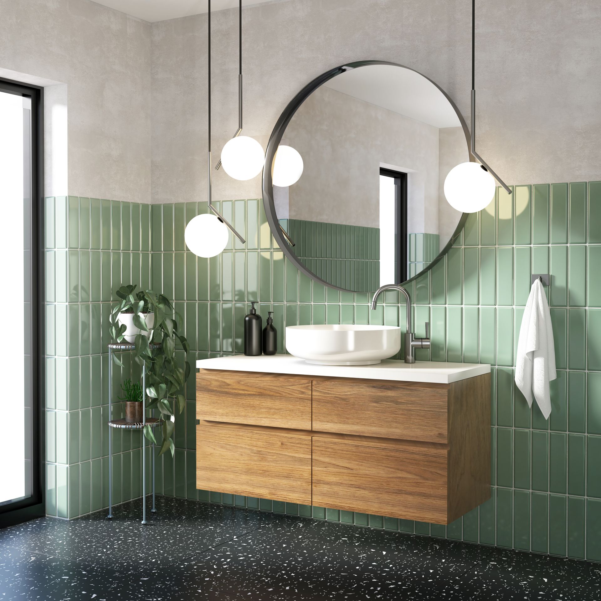 A bathroom with green tiles and a round mirror