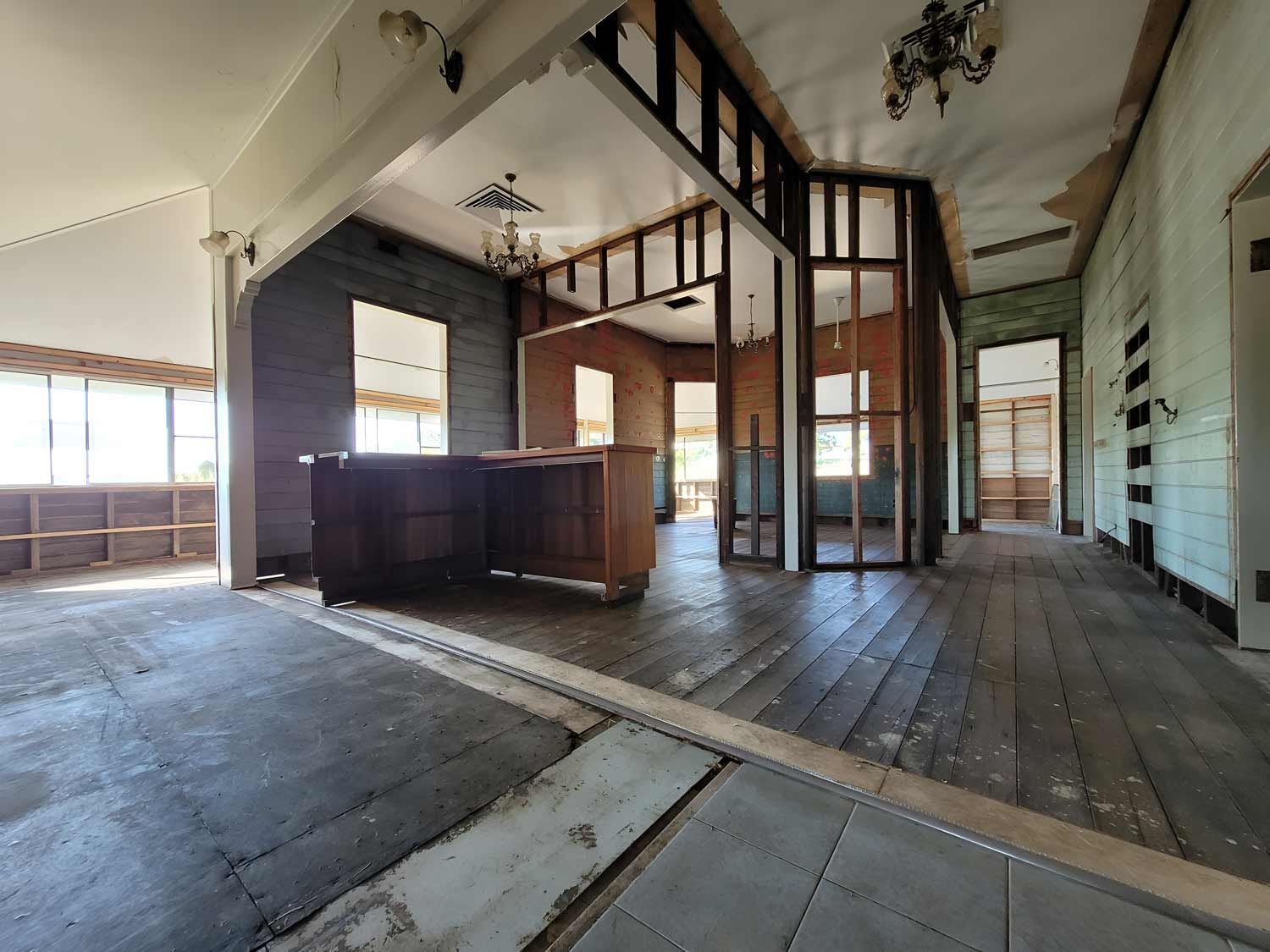 House With Wooden Floors And Walls Under Asbestos Removal — Accredited Asbestos Removers in Casino, NSW