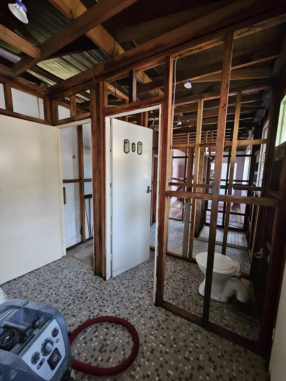 A Room With Wooden Wall Remove For Asbestos Removal — Accredited Asbestos Removers in Casino, NSW