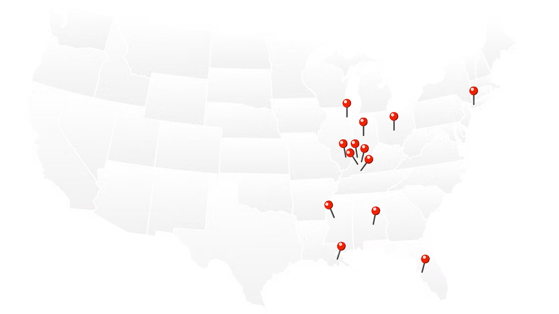 A map of the united states with red pins on it.