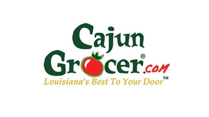 Logo of Cajun Grocer with green text, a red tomato, and the tagline