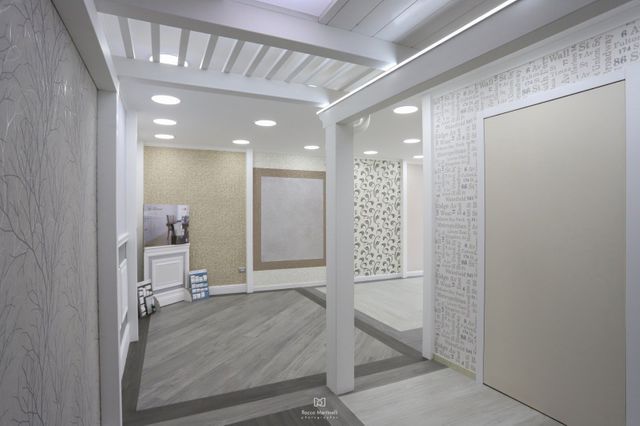 interni punto vendita con pareti con diverse finiture