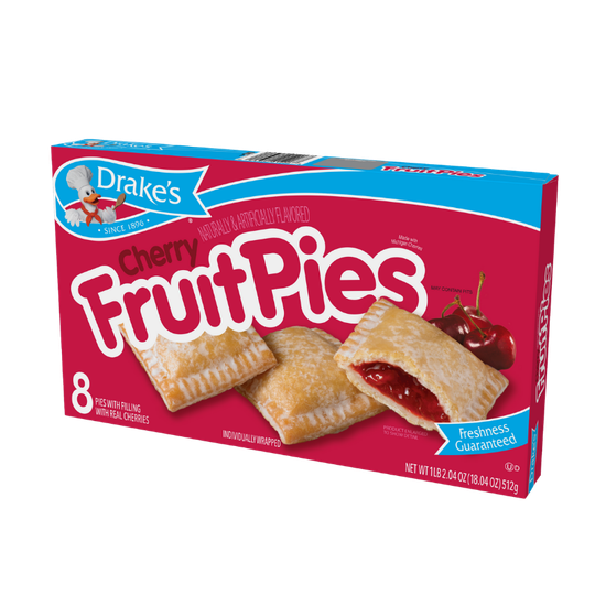 A box of Drake's Cherry Fruit Pies featuring eight individually wrapped pies with a bright red, cherry-filled design.