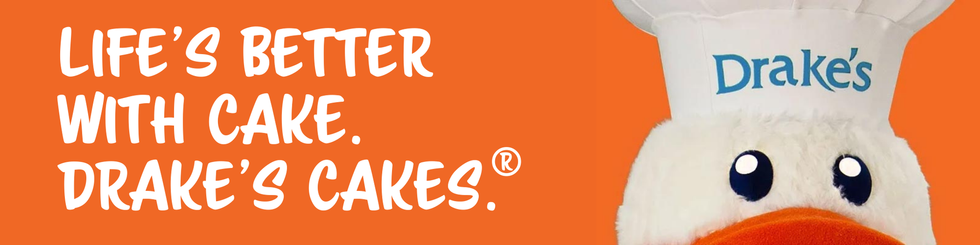 A stuffed duck with the words life 's better with cake drake 's cakes