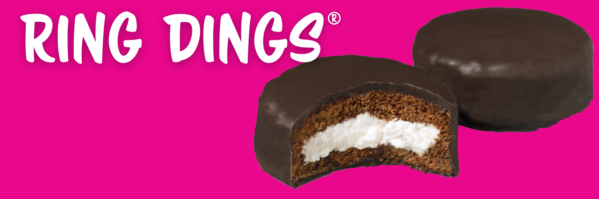 pink banner promoting two cakes with devils food cake and creme layered in the middle one cake has a bite taken out of it. The text reads 