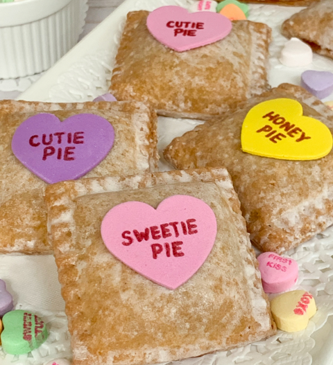 A bunch of pastries with valentine messages