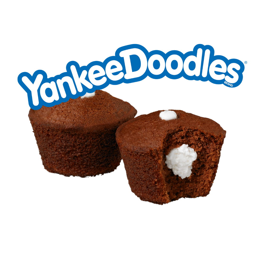 Two yankee doodles cupcakes with a bite taken out of one