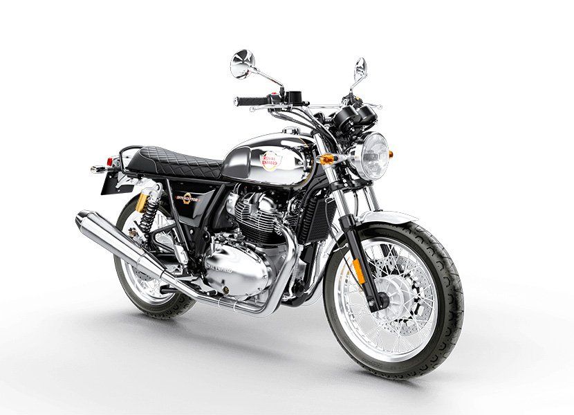 A black and silver motorcycle is parked on a white background.
