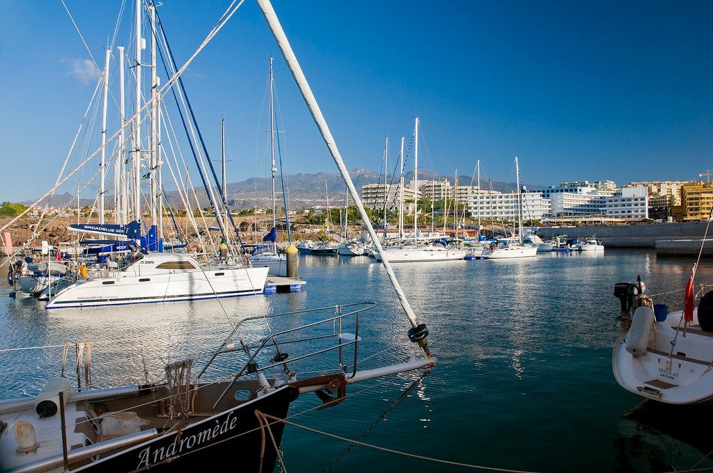 A boat in a harbor with the name seahorse on it