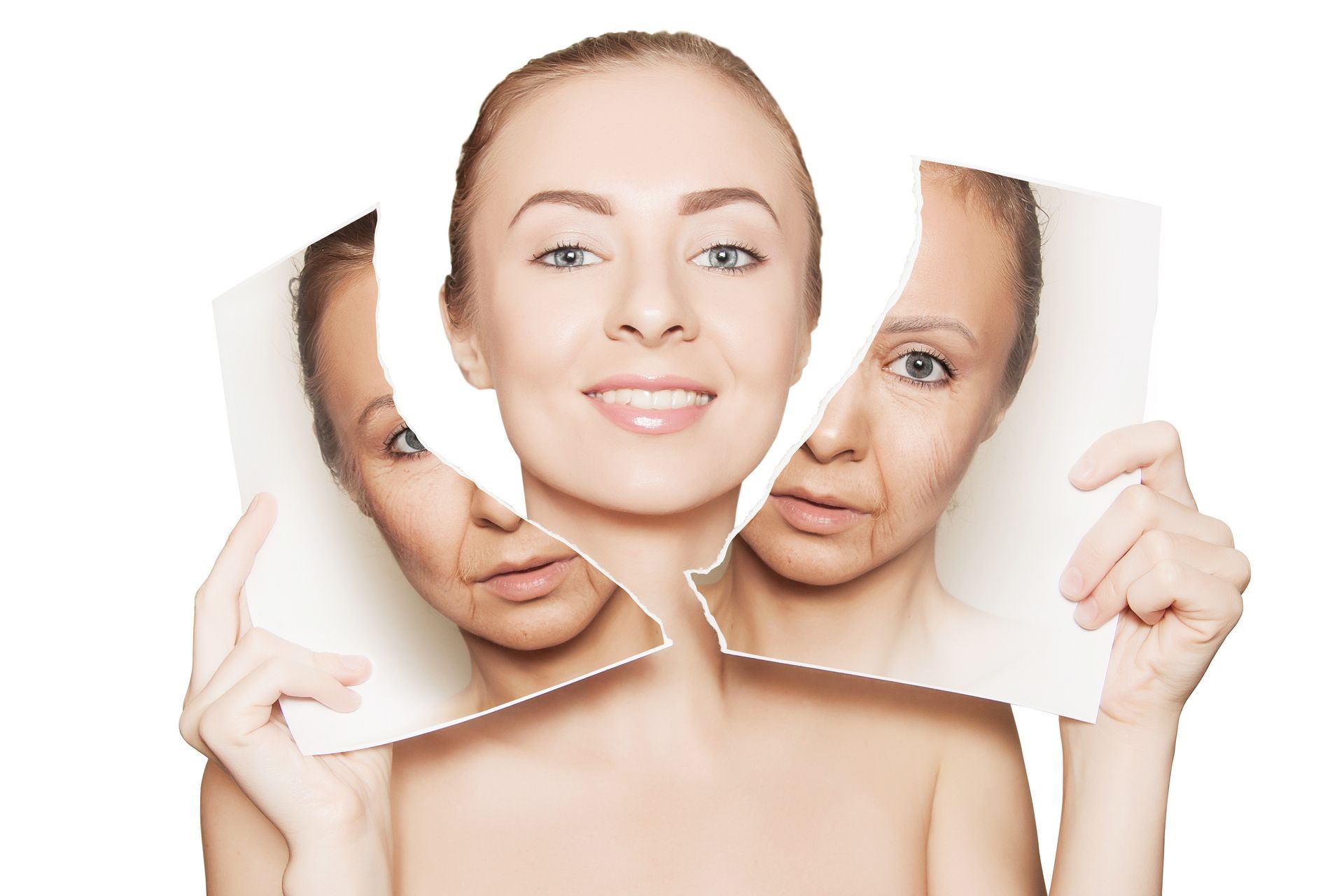 A woman is holding a picture of her face before and after aging.
