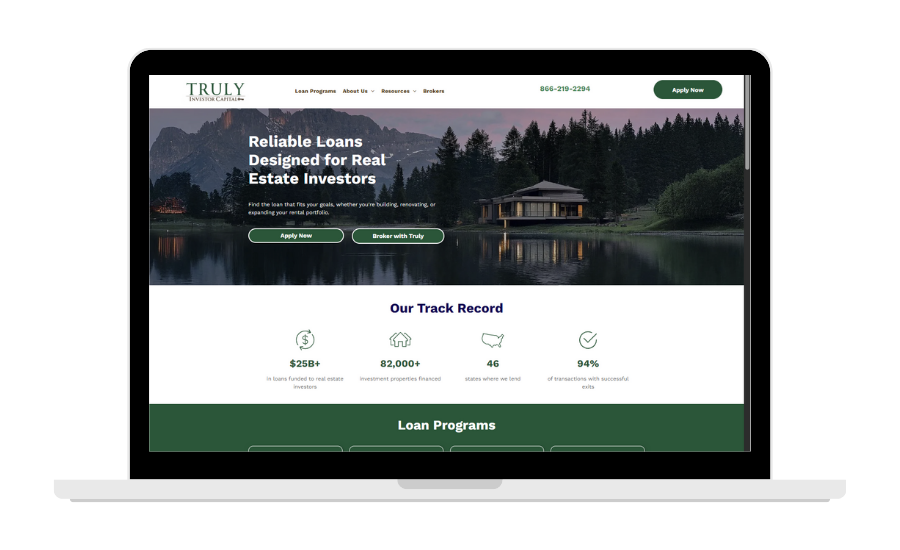 Laptop screen displaying a website for real estate investor loans; website is branded with the name
