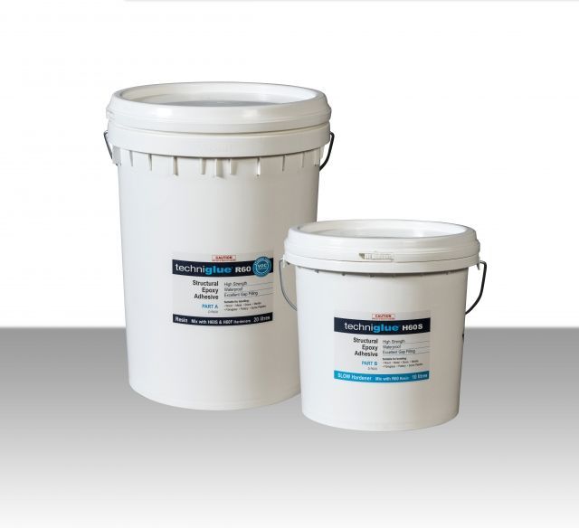 Two White Buckets Are Sitting Next to Each Other on a Table — Envisage Furniture in Kialla, VIC