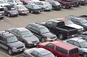 A parking lot crammed with cars