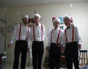 Elders Wearing Christmas Outfit — San Rafael, CA — Terra Linda Christian Homes Inc.