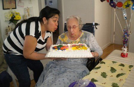 Elder Blowing Her Candles — San Rafael, CA — Terra Linda Christian Homes Inc.