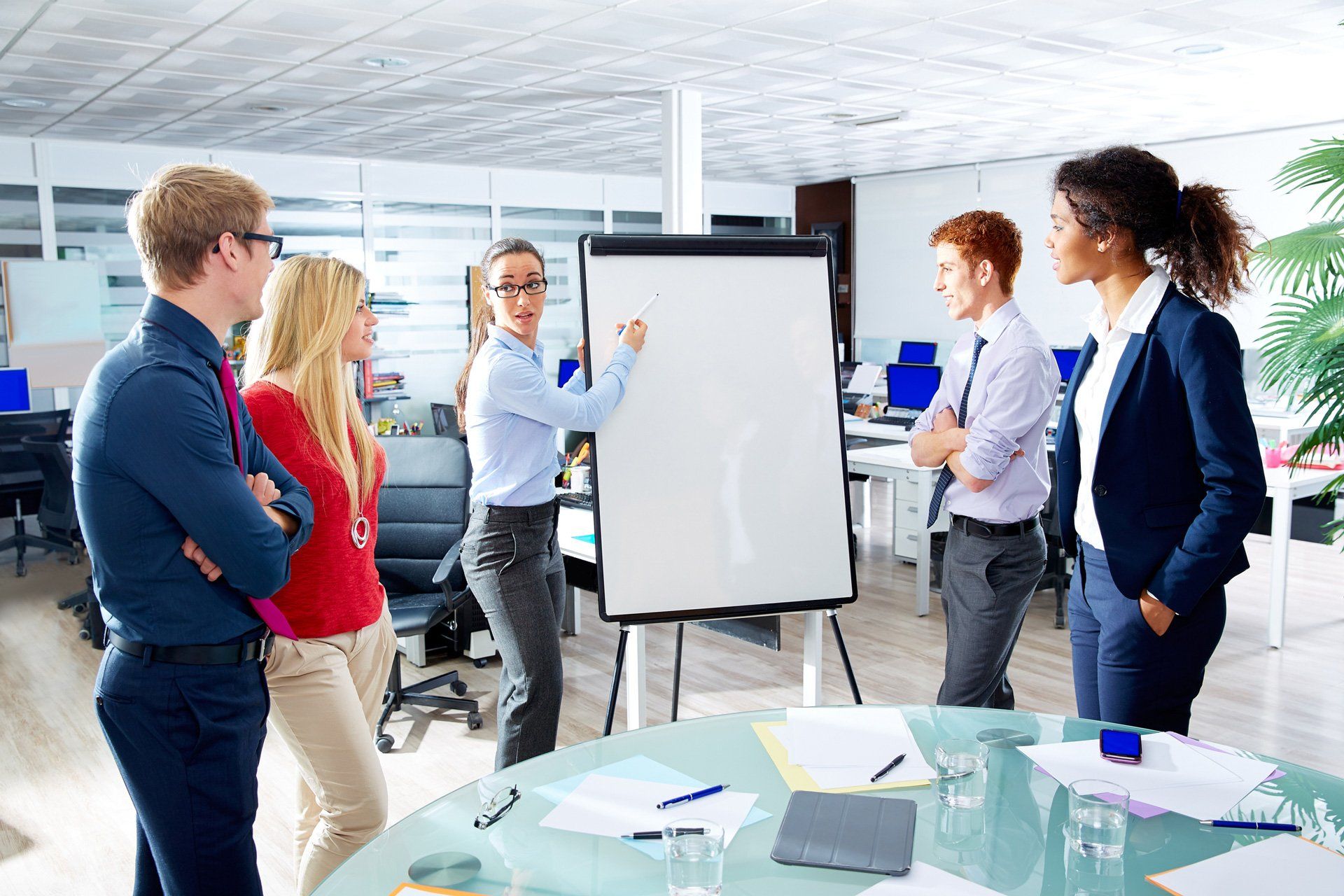 A group of people looking at a whiteboard | Melbourne, VIC | Menzies Advisory