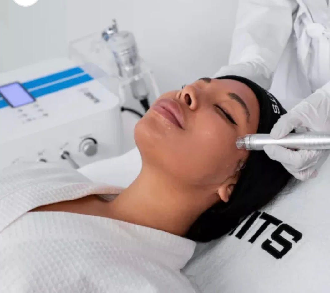 Spa room with copper wheel feature, lit with warm tones.