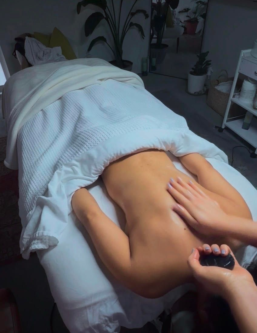 Several boxes of dermalogica products are lined up on a shelf