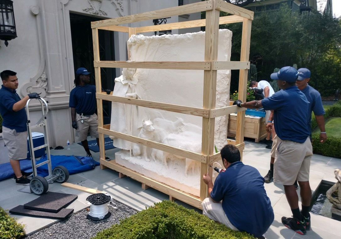 A Large White Building with A Fountain in Front of It — Dallas, TX — Delivery Limited